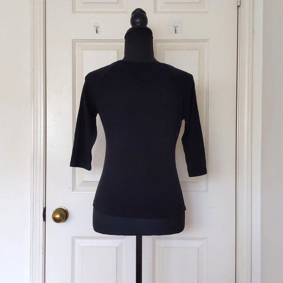 NWOT. Xi Stretch Cropped Tee with 3/4 Sleeve and front decor. - Picture 2 of 4